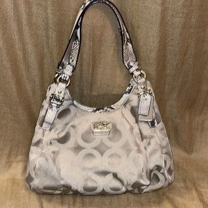 Tan Snake print authentic Coach purse.